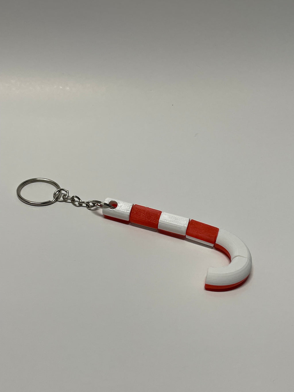 50x Candy Cane twisting fidget keychains.