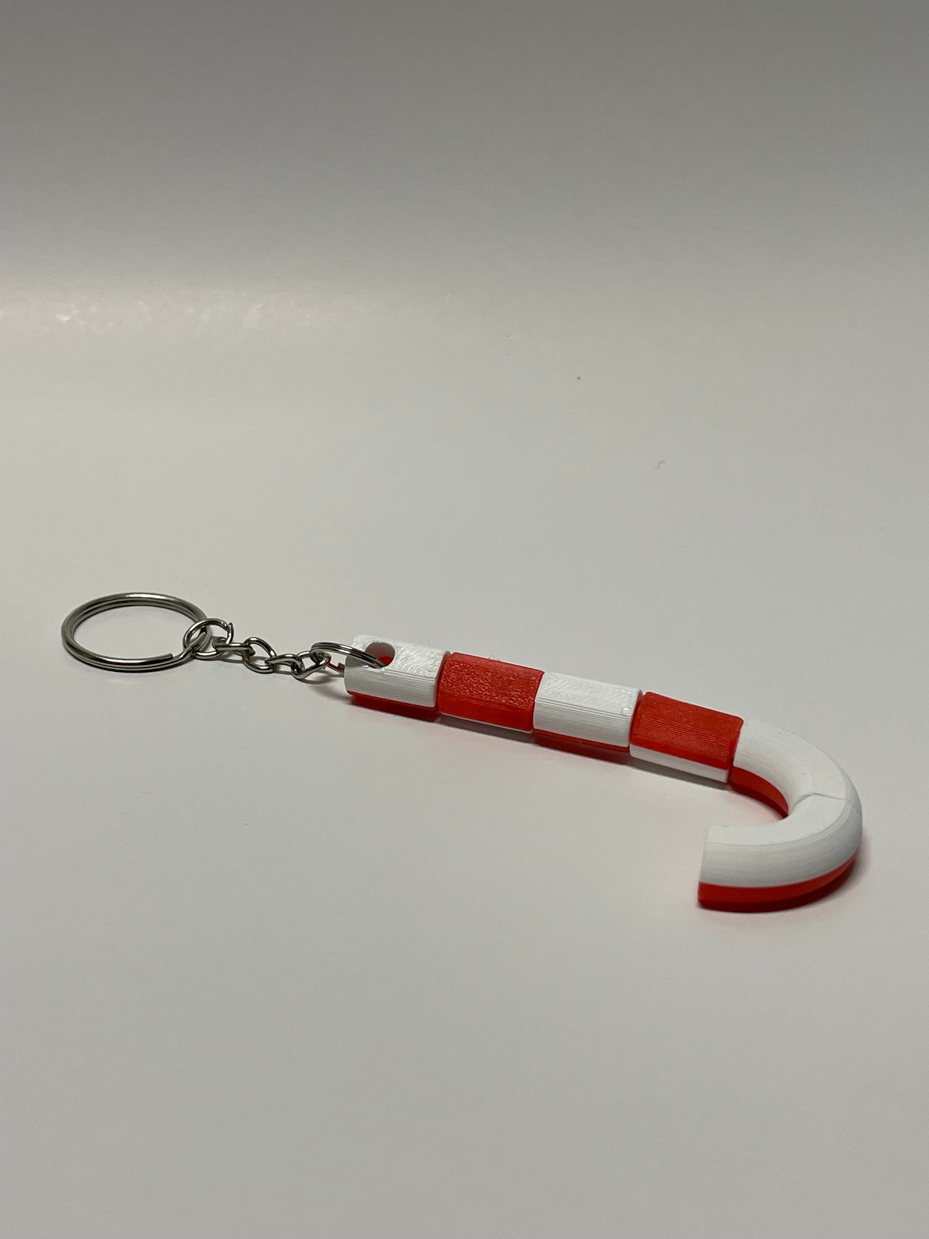 50x Candy Cane twisting fidget keychains.